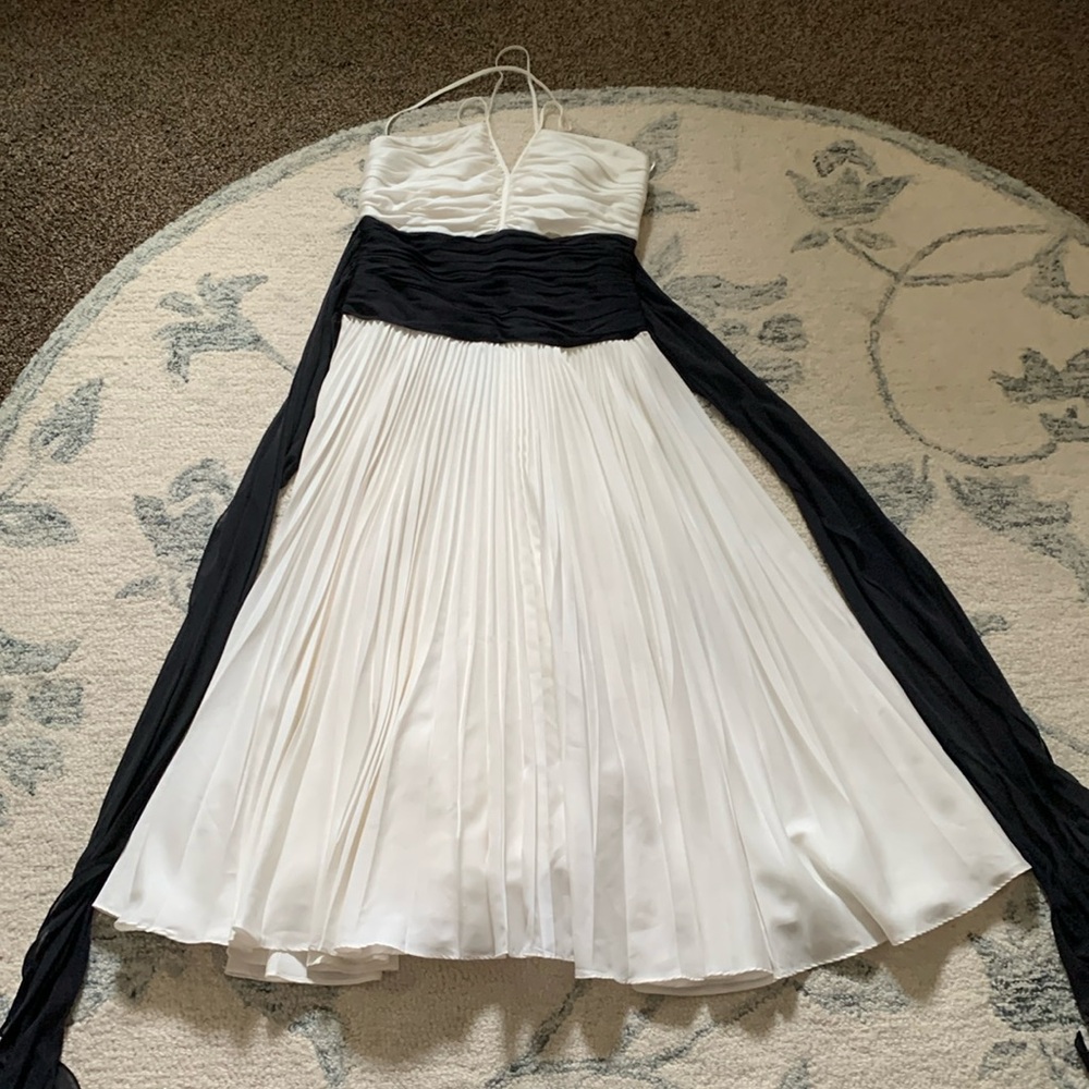 BCBG halter size 4 black/white pleaded dress.